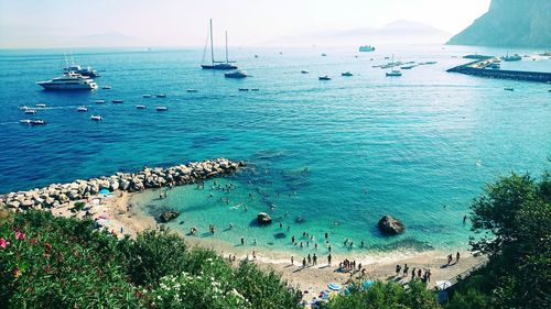 High angle view of boats moored in sea