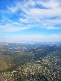 Aerial view of cityscape against sky
