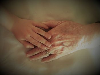 Close-up of couple hands