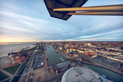 High angle view of city against sky during sunset