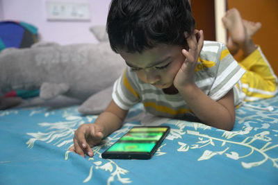 Close-up of boy drawing on table