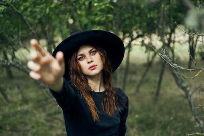 Portrait of young woman looking away