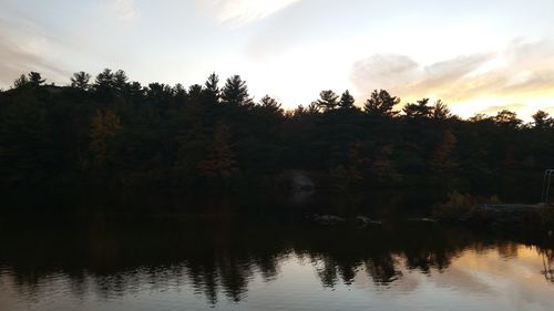 Scenic view of lake at sunset