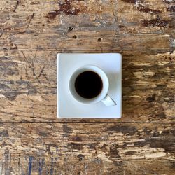 Directly above shot of coffee cup on table