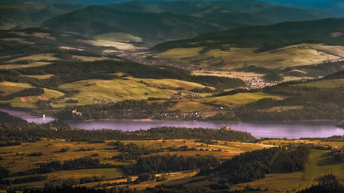 Scenic view of landscape and mountains against sky