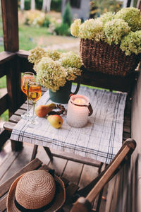 High angle view of wine and fruits on table at restaurant