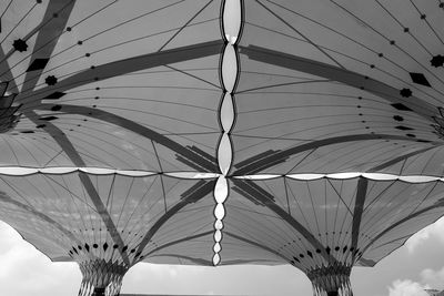 Low angle view of ferris wheel against sky