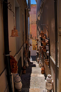 Narrow alley amidst buildings in city