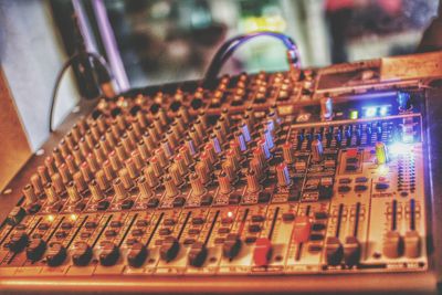 Close-up of sound mixer at studio