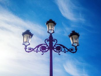 Low angle view of street light against sky