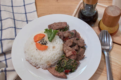 High angle view of meal served on table