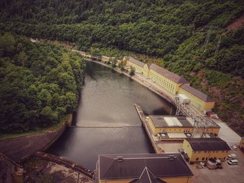 High angle view of bridge over river amidst trees