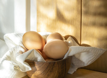 Close-up of eggs on table at home