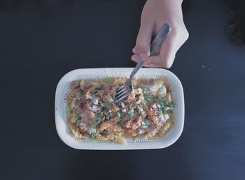 High angle view of woman having food