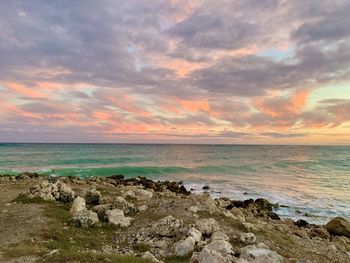 Scenic view of sea against sky during sunset