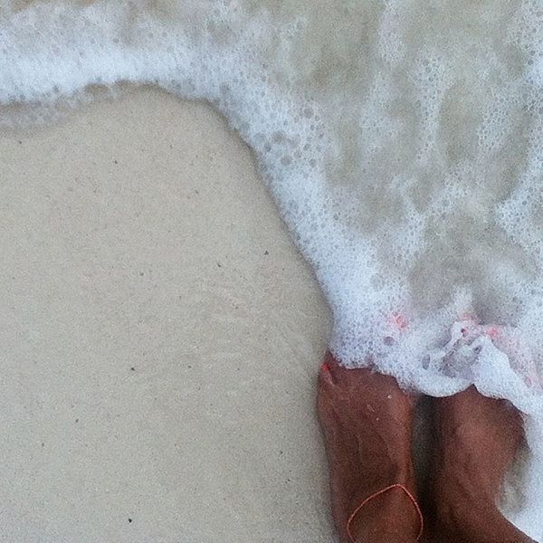 high angle view, low section, sand, person, beach, human foot, barefoot, personal perspective, water, shore, part of, white color, surf, close-up, lifestyles, leisure activity, day