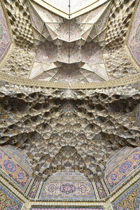 Low angle view of ceiling of temple