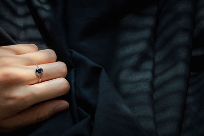 Midsection of man holding hands