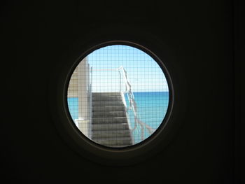 Building seen through glass window