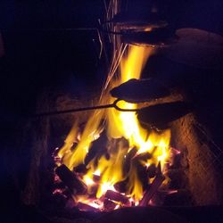 Close-up of fire flame at night
