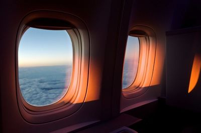 Aerial view of sea seen through airplane window