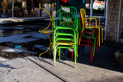 Empty chairs on street