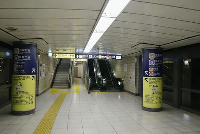 Information sign on illuminated subway station