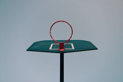 Low angle view of basketball hoop against sky