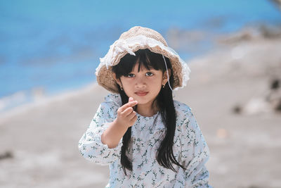 Portrait of a girl standing on beach