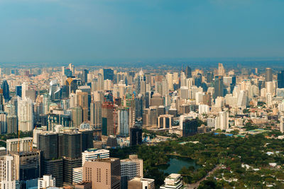 High angle view of buildings in city against clear sky