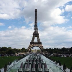 View of tower against cloudy sky