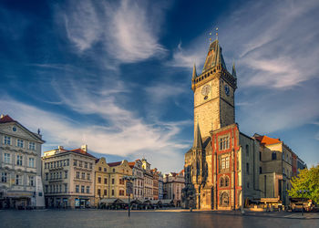 View of buildings in city against sky