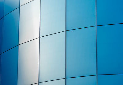 Low angle view of building against blue sky