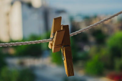 Close-up of rope tied on wooden post
