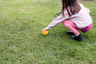 Girl playing on field