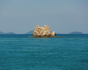 Scenic view of sea against clear blue sky