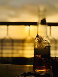 Close-up of beer glass on table