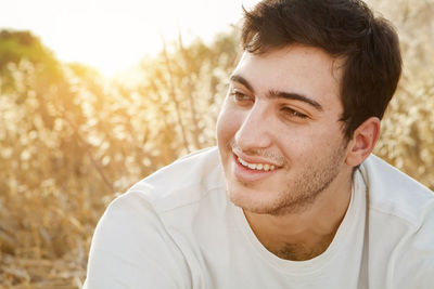 Portrait of young man smiling