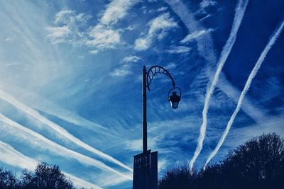 Low angle view of vapor trail in sky