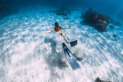 Man swimming in sea