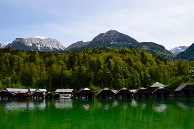 Scenic view of lake with mountains in background