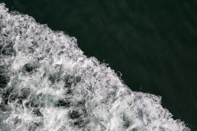 Close-up of waves splashing in sea