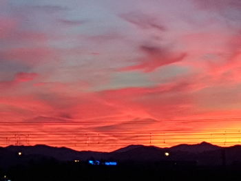 Scenic view of dramatic sky during sunset