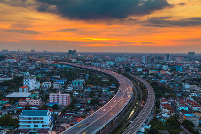 High angle view of cityscape against sky during sunset