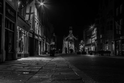 Illuminated street at night