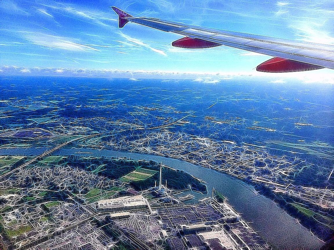 flying, air vehicle, airplane, aircraft wing, transportation, aerial view, landscape, mid-air, mode of transport, part of, travel, on the move, cropped, public transportation, journey, scenics, airplane wing, sky, vehicle part, aircraft