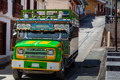Colombian colorful rural bus, called chiva, at the streets of the heritage town of aguadas