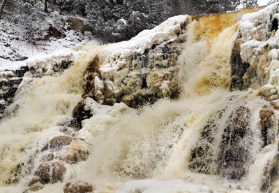 Close-up of water flowing through rocks