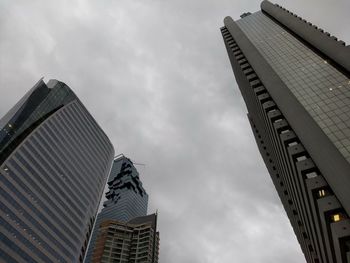 Low angle view of skyscrapers against sky