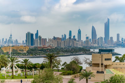 View of buildings in city against sky